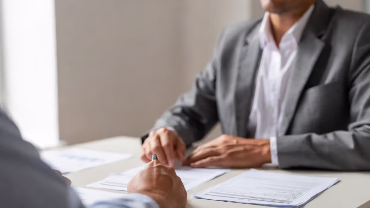 Client discussing life insurance conversion with financial advisor